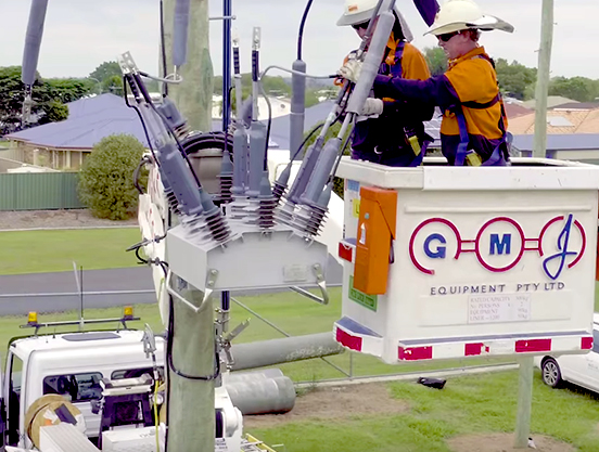 Linemen working on a NOJA Power OSM recloser