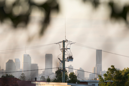 NOJA Power Recloser overlooking the Brisbane city skyline.